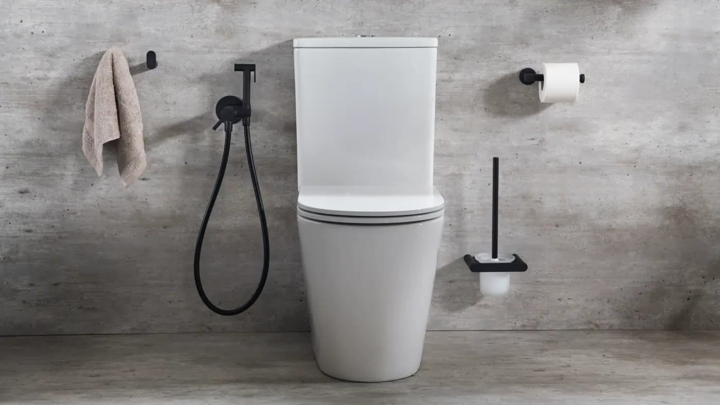 ramonsoler toilet with a black bidet shower